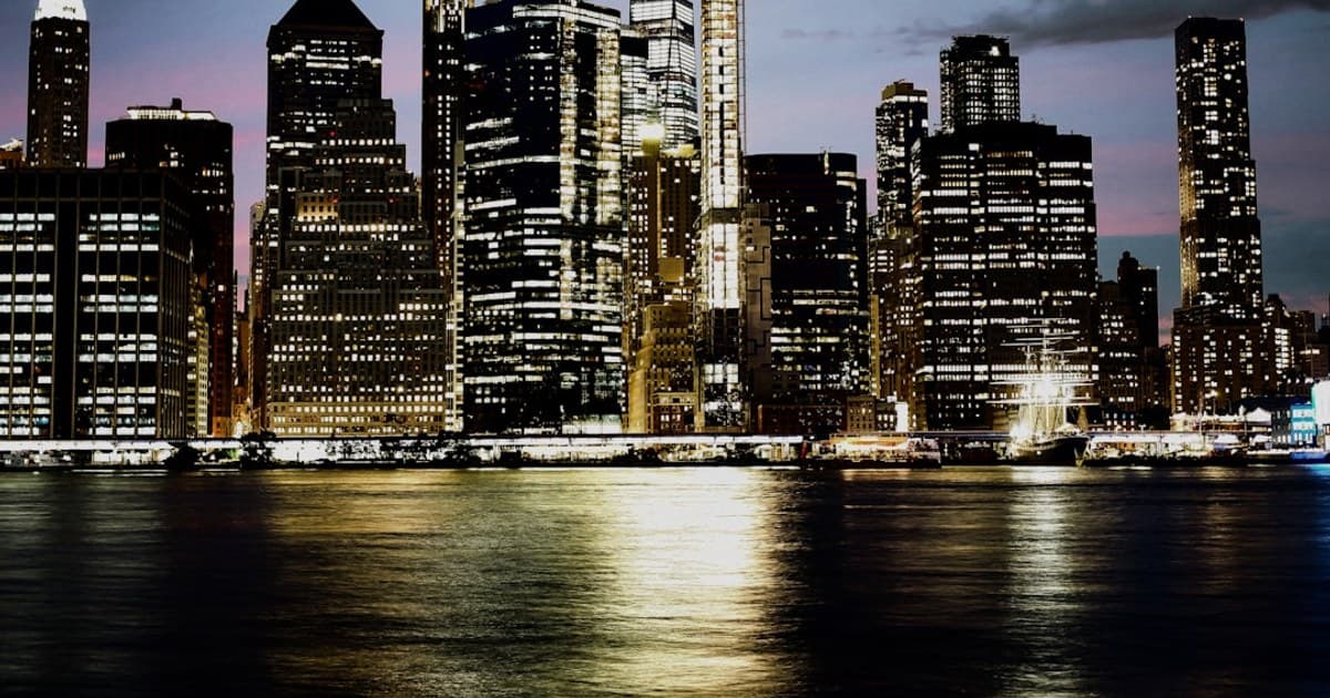 Manhattan lights up at dusk